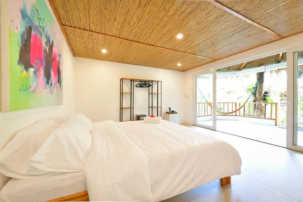 Ac2 - Bamboo Bungalows Rest House By White